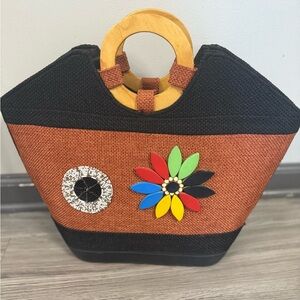 Elegant Black and Brown Tote with Floral Accents